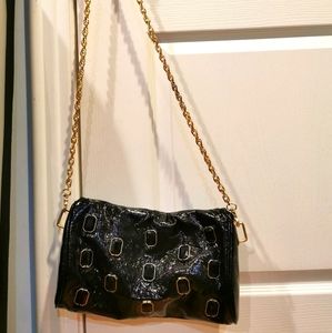 Fashion handbag with gold toned chain